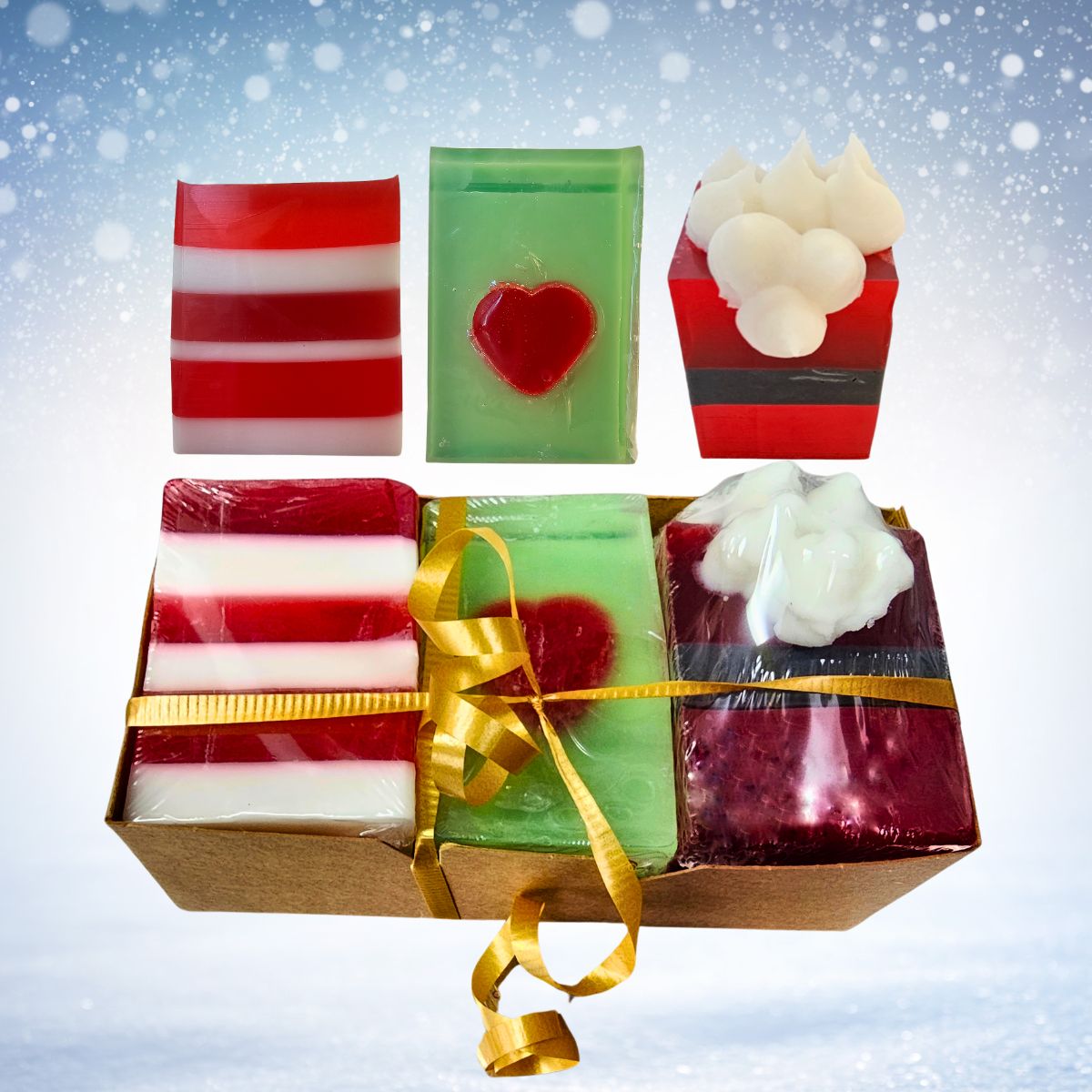 coffret de savons festifs naturels en formes variées (flocon, bonhomme, cœur), idéal pour noël.